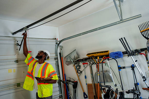 Professional Garage Door Panel Replacement technician working in Millington, TN